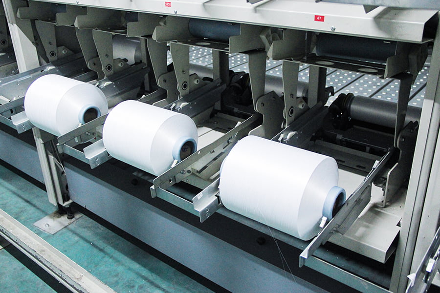 W jaki sposób opcje denierów i liczby włókien wpływają na wydajność i użytkowanie przędzy FDY?